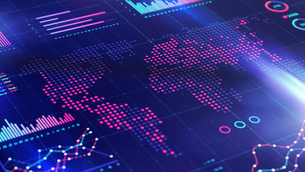 Abstract world map and financial graphs iStock-1388369589.jpg 3