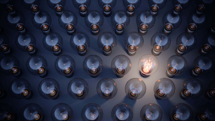 Glowing Light Bulb Standing Out From the Crowd iStock-1253473993 website.jpg 2